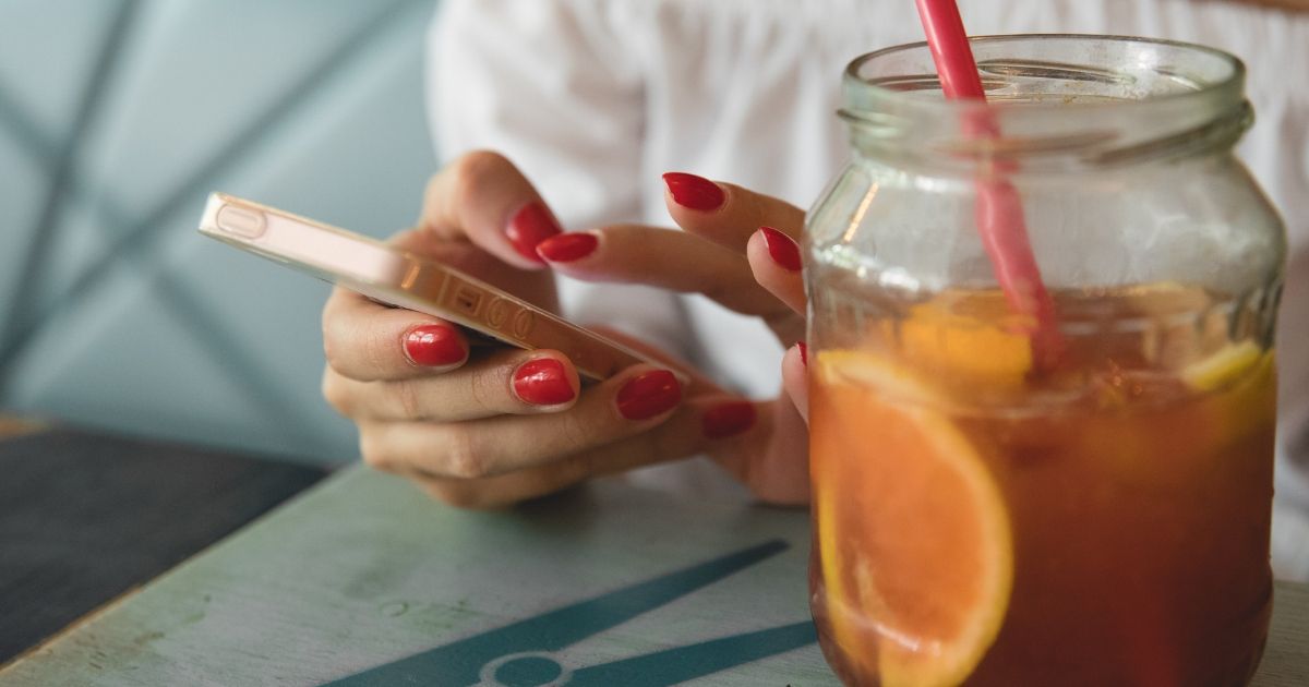 a girl on her phone using voice search